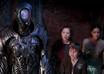 In the series Lost in Space, of what did the Robot B-9 keep warning young Will Robinson?