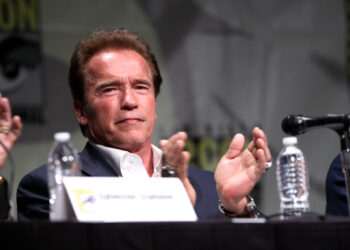 When did Arnold Schwarzenegger first step foot in America?