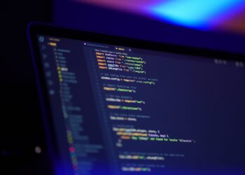 What was the name of the computer programming language created by John G. Kemeny, Thomas E. Kurtz, and Mary Kenneth Keller back in the 1960s?