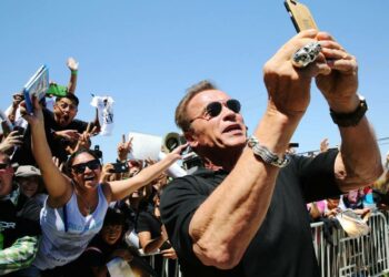 What was Arnold Schwarzenegger’s debut film?