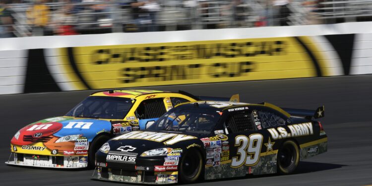 Which car won the 24 Hours of Le Mans for Ford Motor Company for the first time?